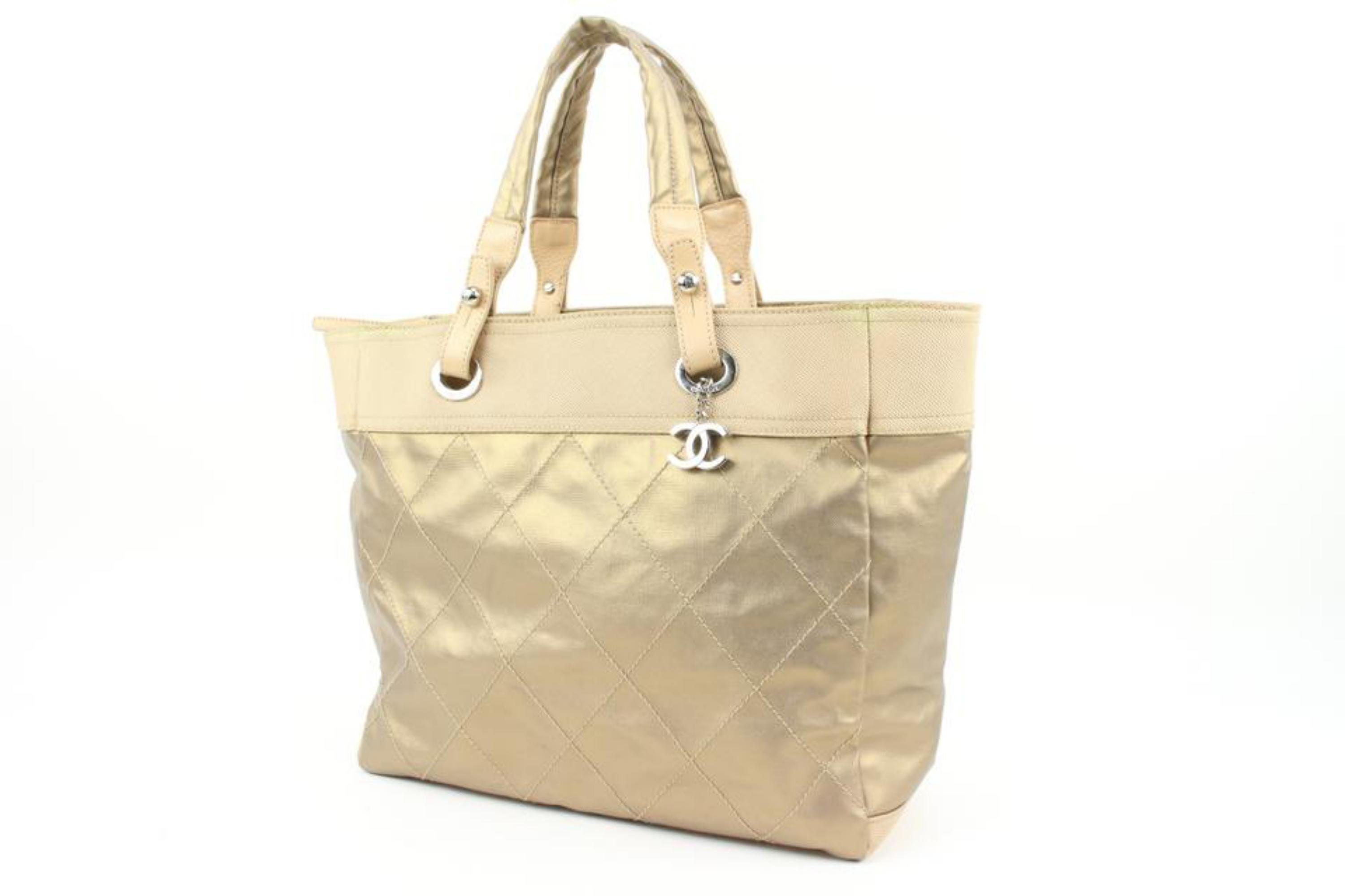 Chanel Gold Quilted CC Logo Biarritz GM Tote 8c131s
Date Code/Serial Number: 11390274
Made In: Italy
Measurements: Length:  17.5