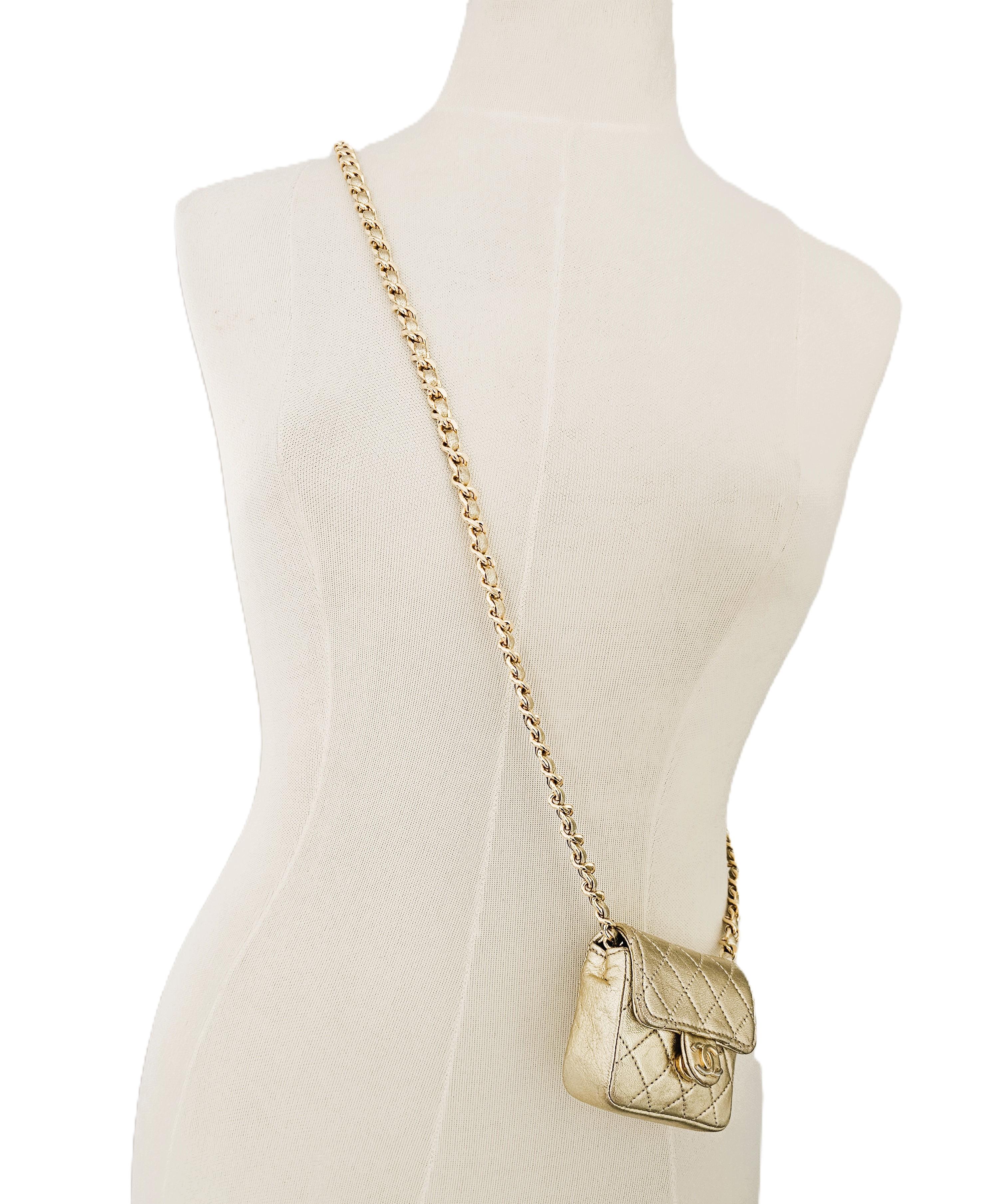 Exceptional RARE Vintage 1981 Chanel Gold Quilted Lambskin Micro Mini Flap Bag.
Own a true piece of fashion history with this ultra-rare Chanel Micro Mini Flap Bag from 1981 — a collector’s dream and a stunning conversation starter. This vintage gem