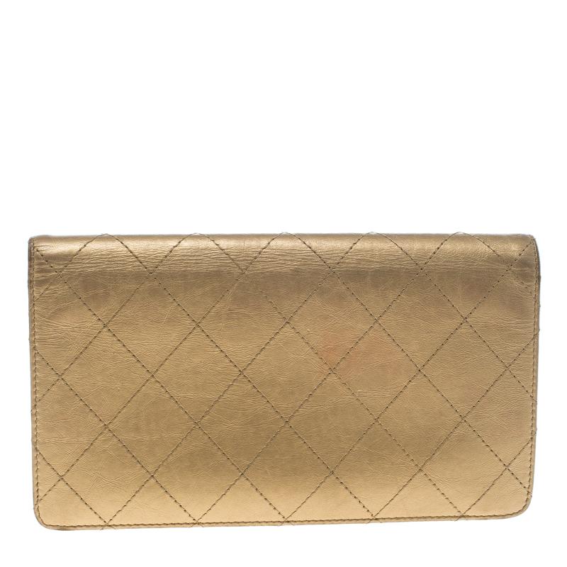 This wallet from Chanel brings along a touch of luxury and immense style. It comes crafted from quilted leather and equipped with slip compartments and multiple slots just so you can neatly carry your cards and cash. This golden beauty is complete