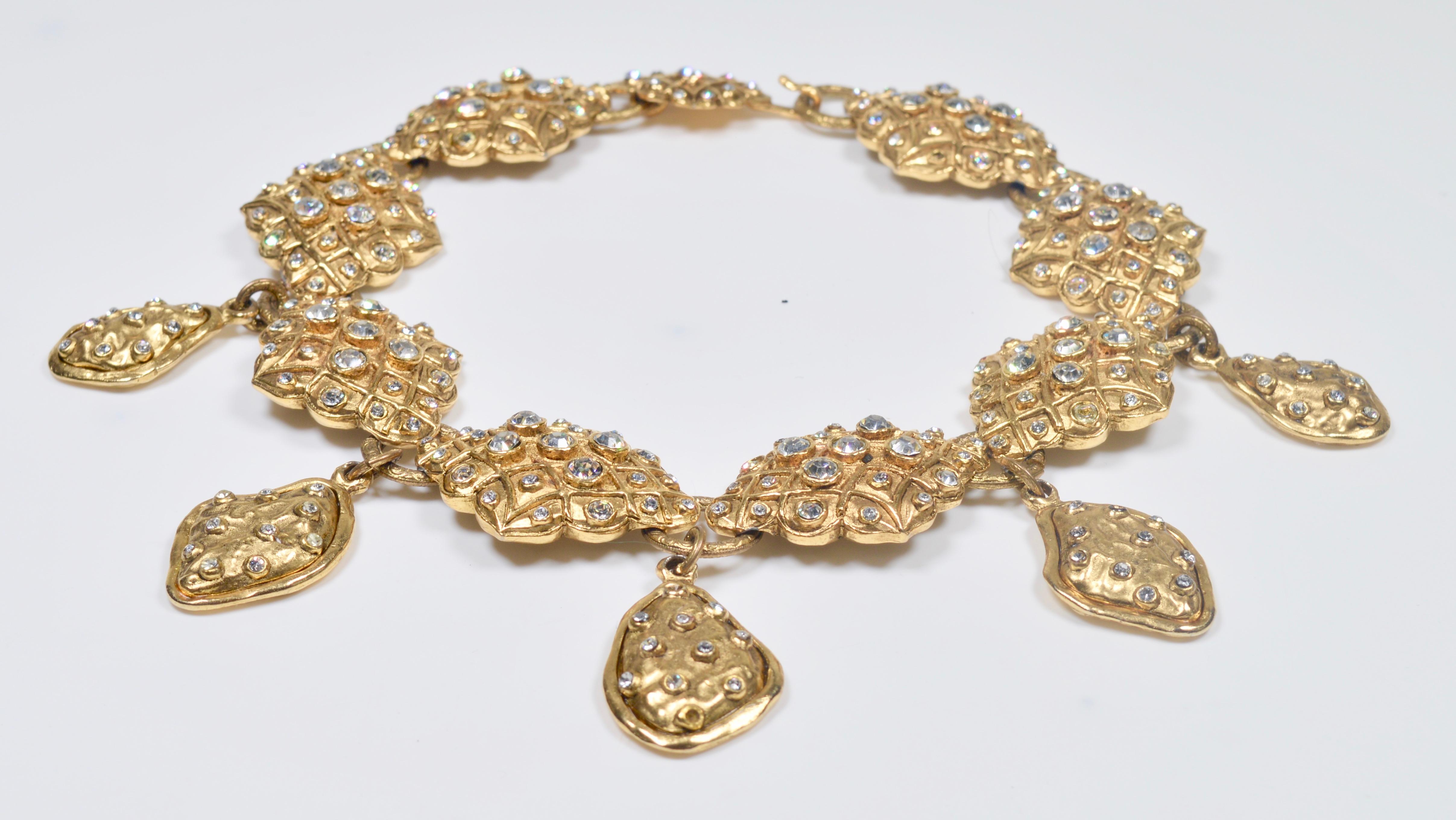 A beautiful collar necklace with one of the marks used by the House of Chanel in the 1970s and into the early 1980s.
The necklace appears to have never been worn but 6 fo the smaller rhinestones are missing.
The main links  measure 5 cm x 3.5 cm

