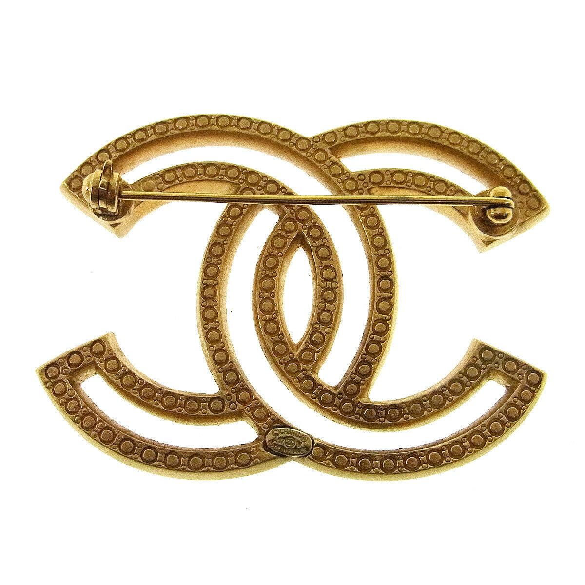 Chanel Gold Rhinestone Charm Lapel Evening Pin Brooch In Good Condition In Chicago, IL