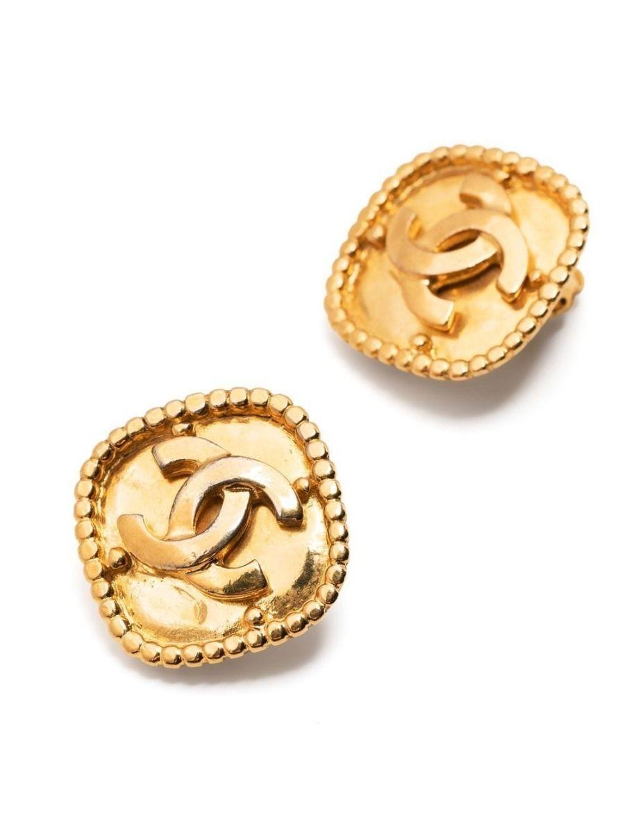 Designed to uplift any outfit, these vintage Chanel earrings from 1996 display the Chanel CC and bead detailing embossed on large gold-toned rhombuses. Designed with a clip-on fastening, these beautiful earrings can be enjoyed by everyone. Pair with