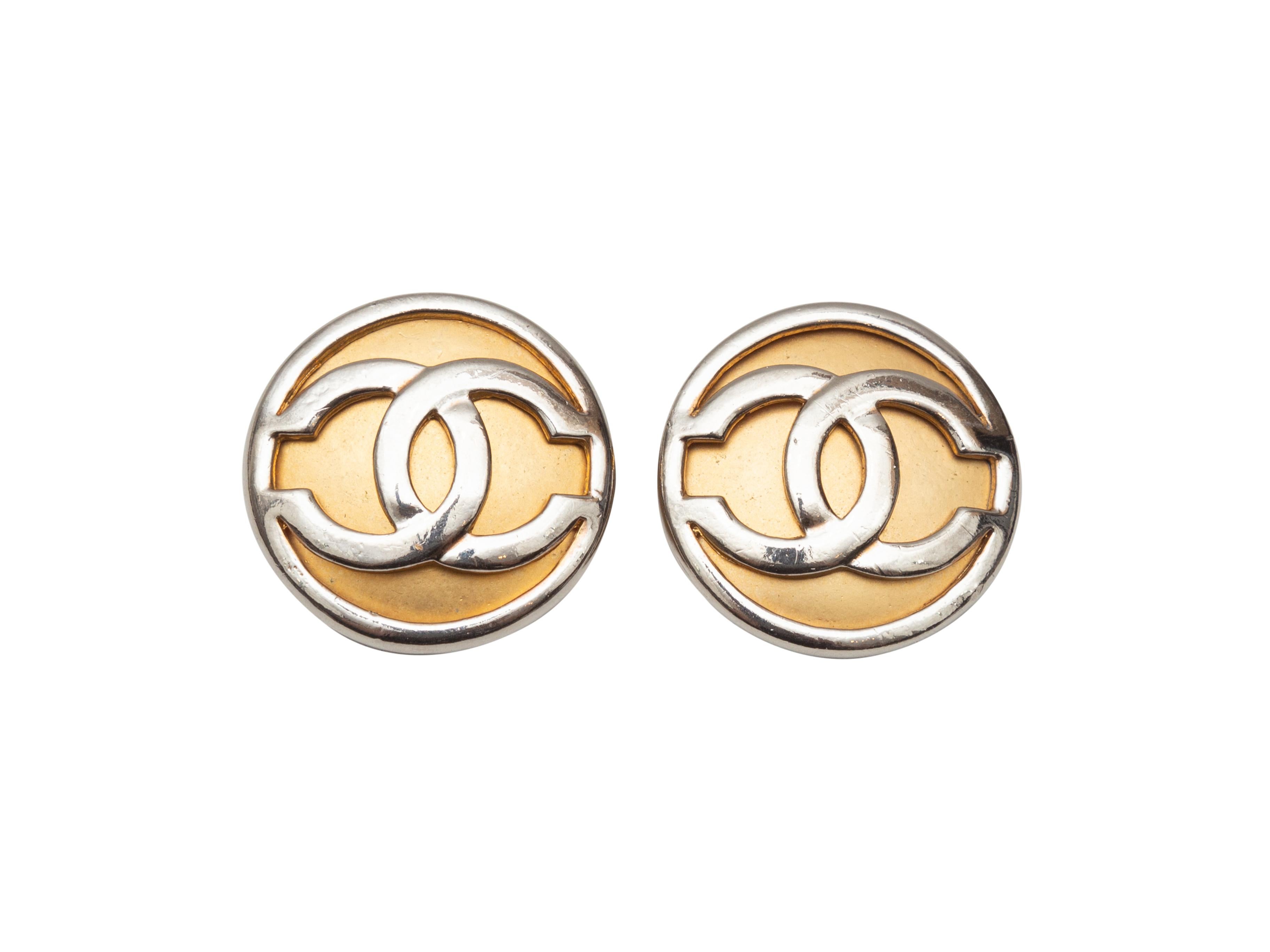 Product details: Vintage gold and silver metal CC clip-on earrings by Chanel. Circa 1980s. 1.25