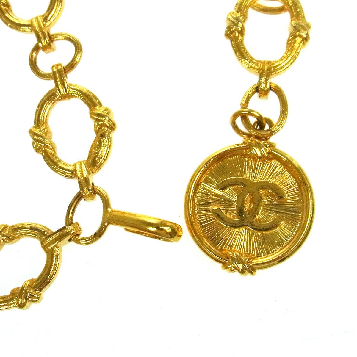 Chanel Gold Textured Metal Coin Medallion Chain Waist Belt

Metal 
Gold tone hardware
Hook closure
Made in France
Width 1