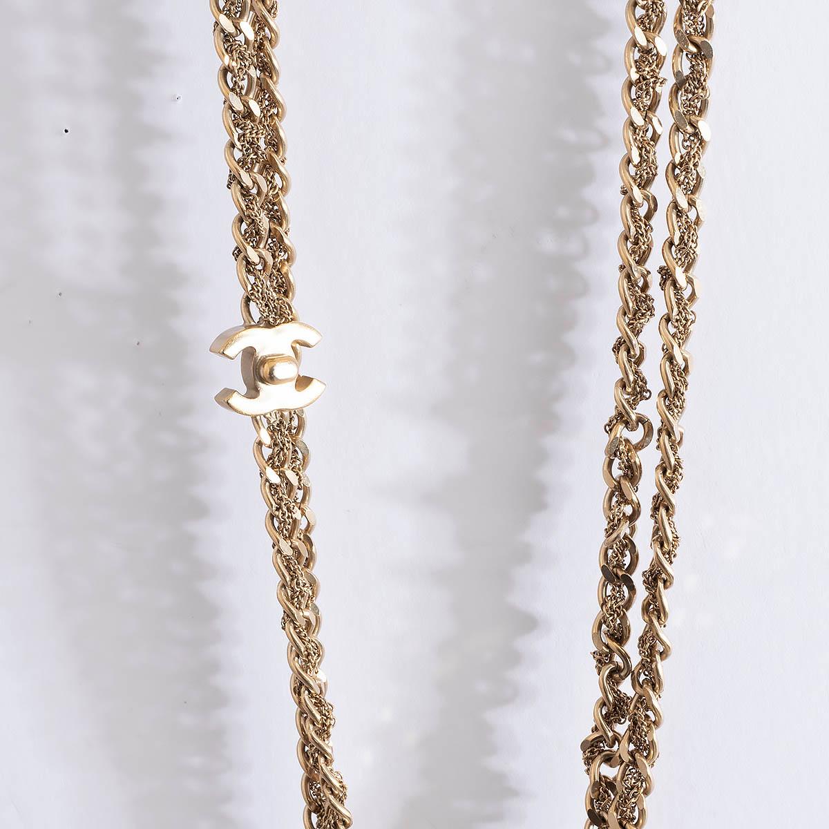 100% authentic Chanel 2012 CC faux turnlock interwoven double chain necklace in gold-tone brass. Can be worn as a necklace or a belt. Has been worn and is in excellent condition. 

Measurements
Model	12P
Width	1.6cm (0.6in)
Length	100cm