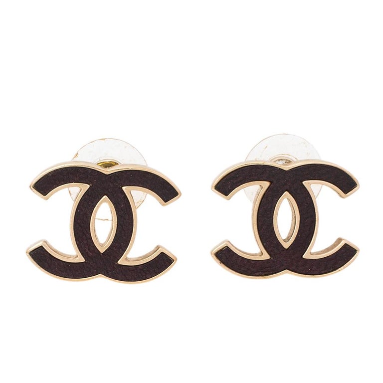 Chanel Gold Tone and Oxblood Leather CC Stud Earrings at 1stDibs