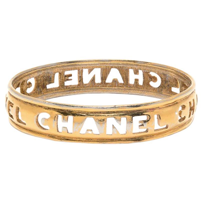 Chanel Gold-Tone Bangle Logo Cut-Out Bracelet