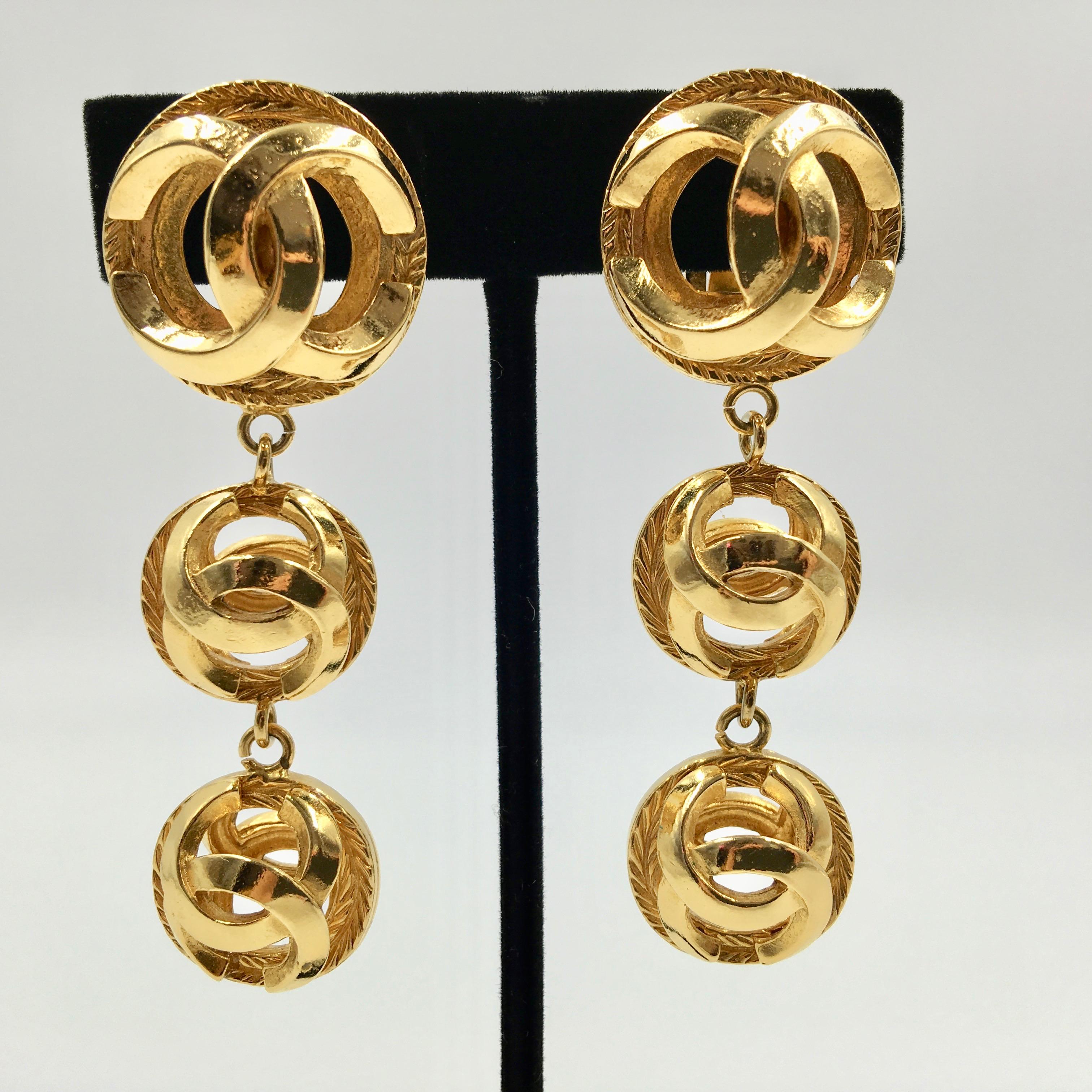 Chanel Gold Tone CC Logo Drop Clip On Earrings. Stamped Chanel. In very good vintage condition.

Measurements are as follows:
Length- 2 3/4