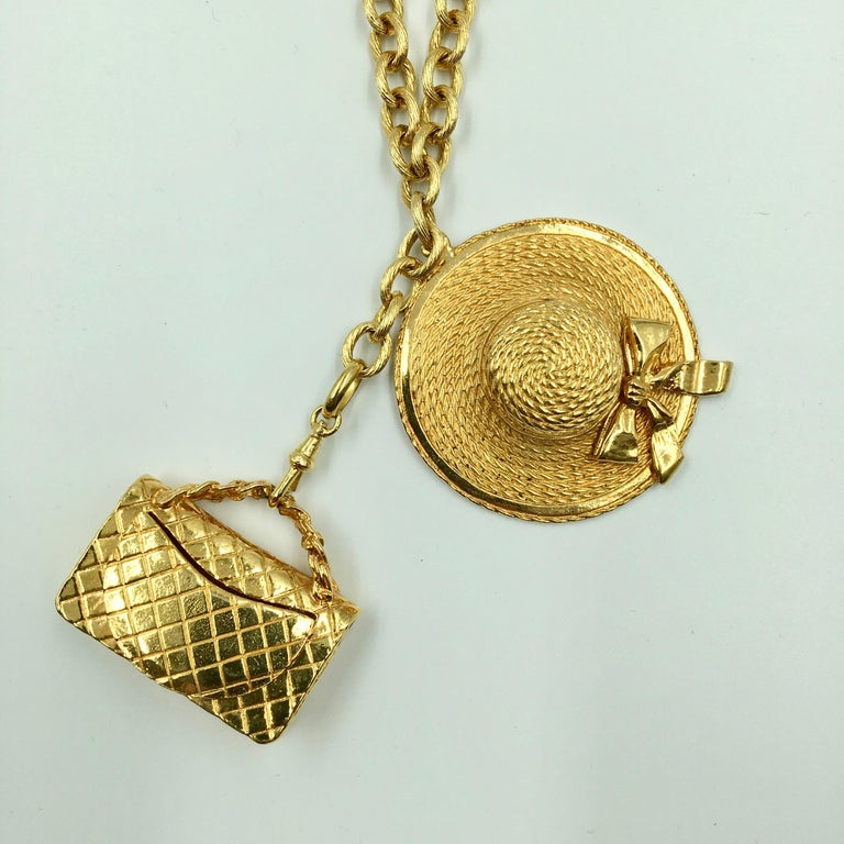 Chanel Gold Tone Classic Coco Chanel Chapeau and Quilted Handbag Charm Necklace at 1stDibs