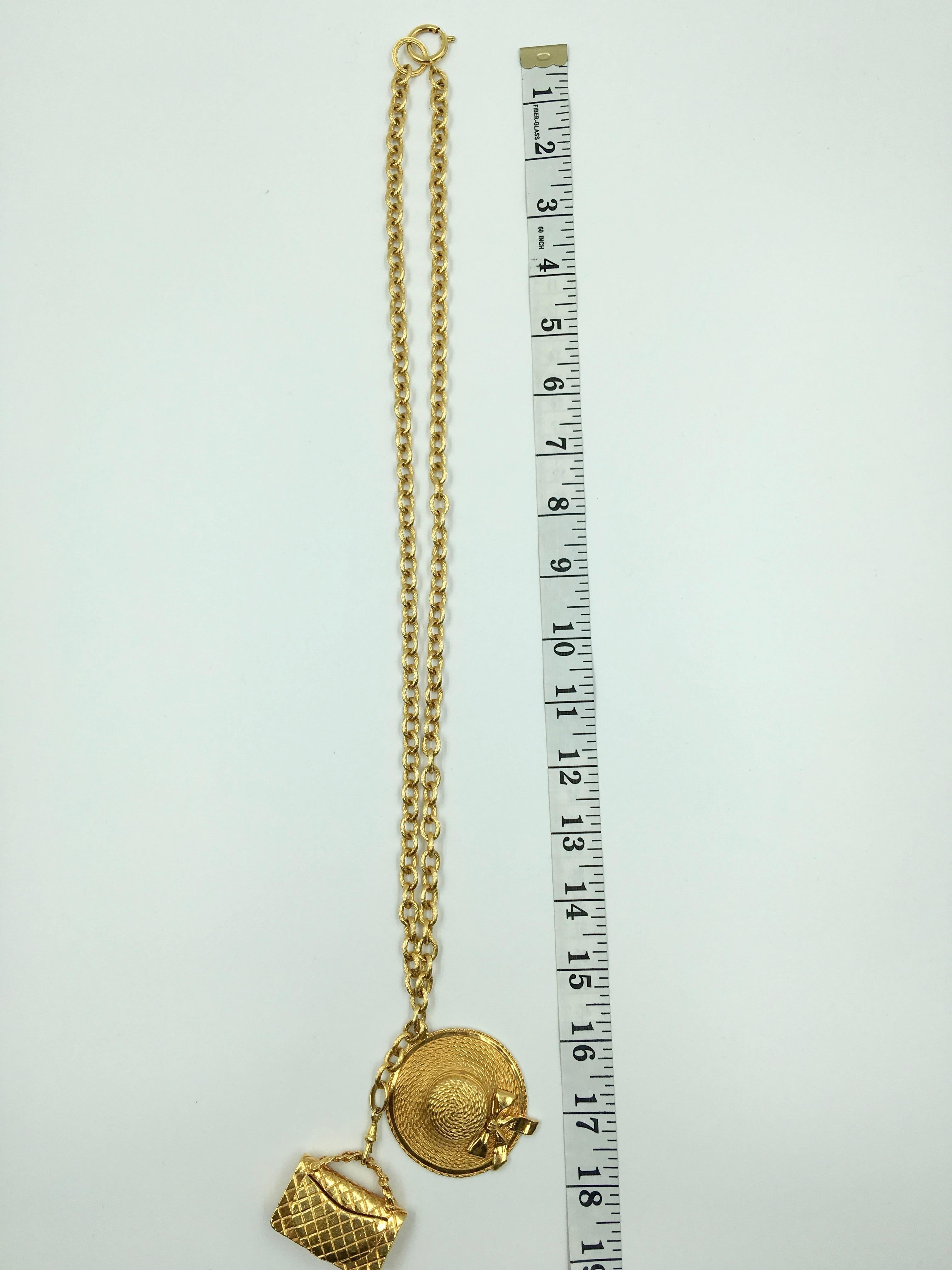 Contemporary Chanel Gold Tone Classic Coco Chanel Chapeau and Quilted Handbag Charm Necklace For Sale