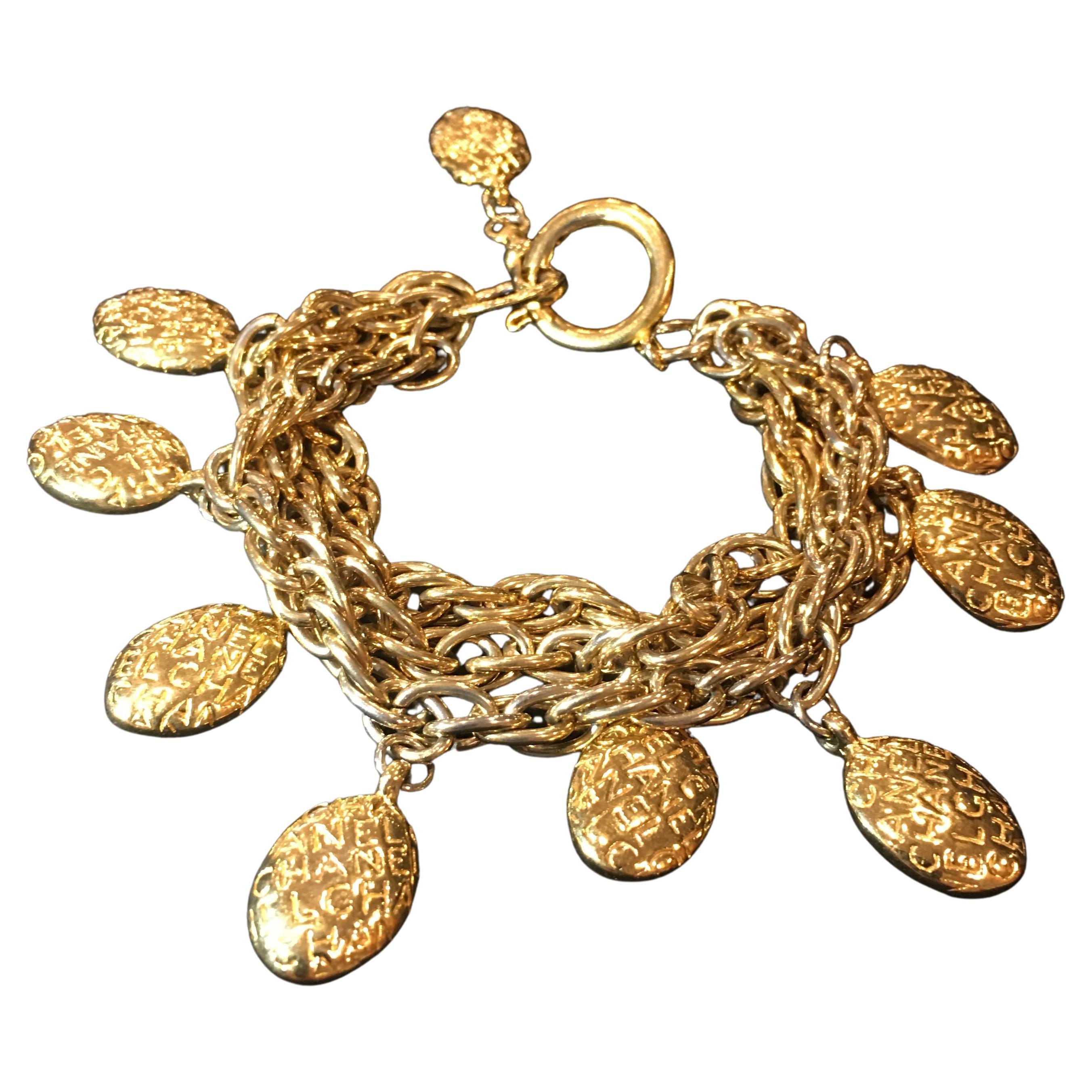 Chanel Gold Tone Custom Beads Multi Strand Charm Logo Bracelet, 1980's