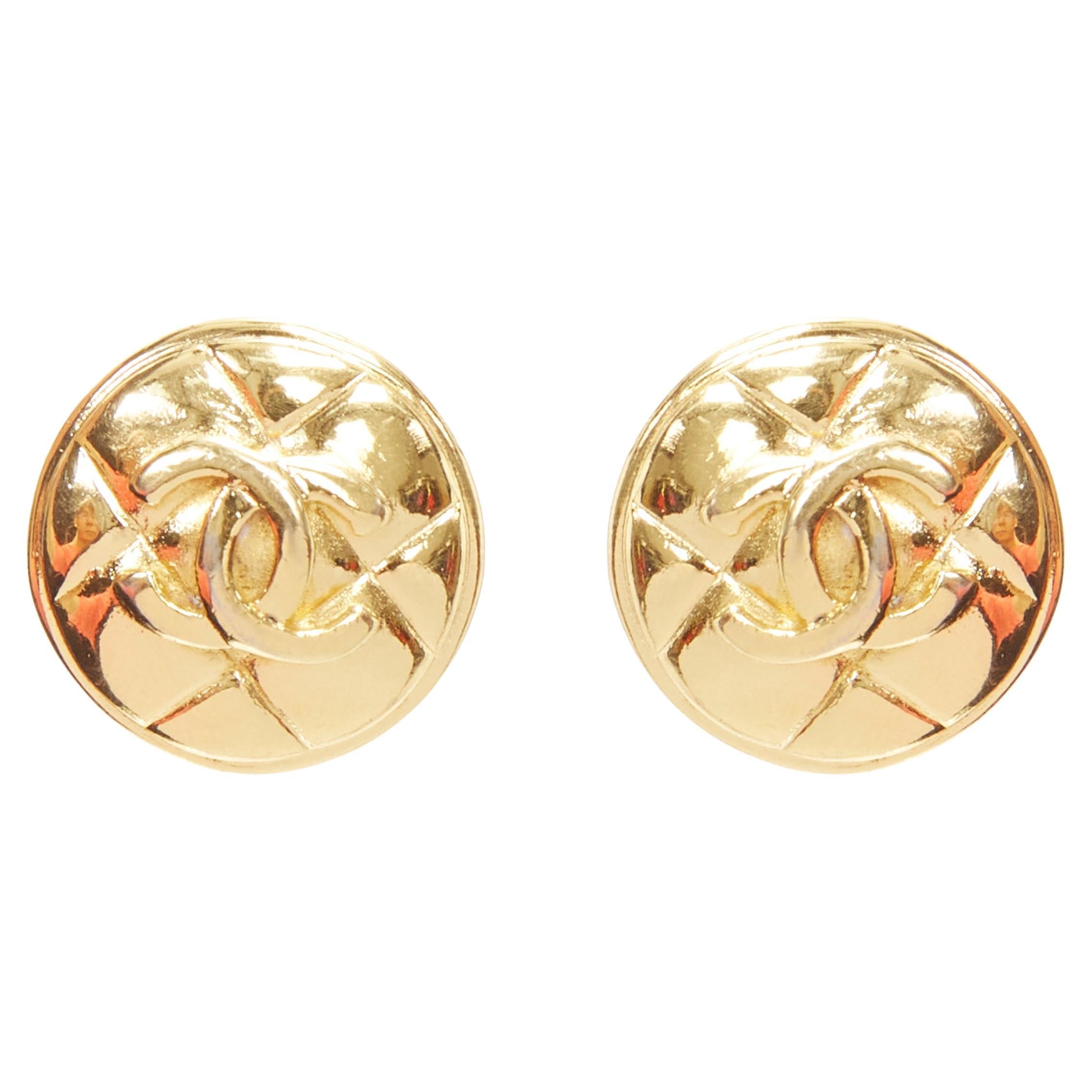 CHANEL gold tone diamond quilted CC logo medallion coin clip on earring