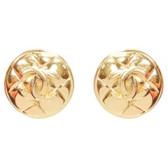 CHANEL gold tone diamond quilted CC logo medallion coin clip on earring