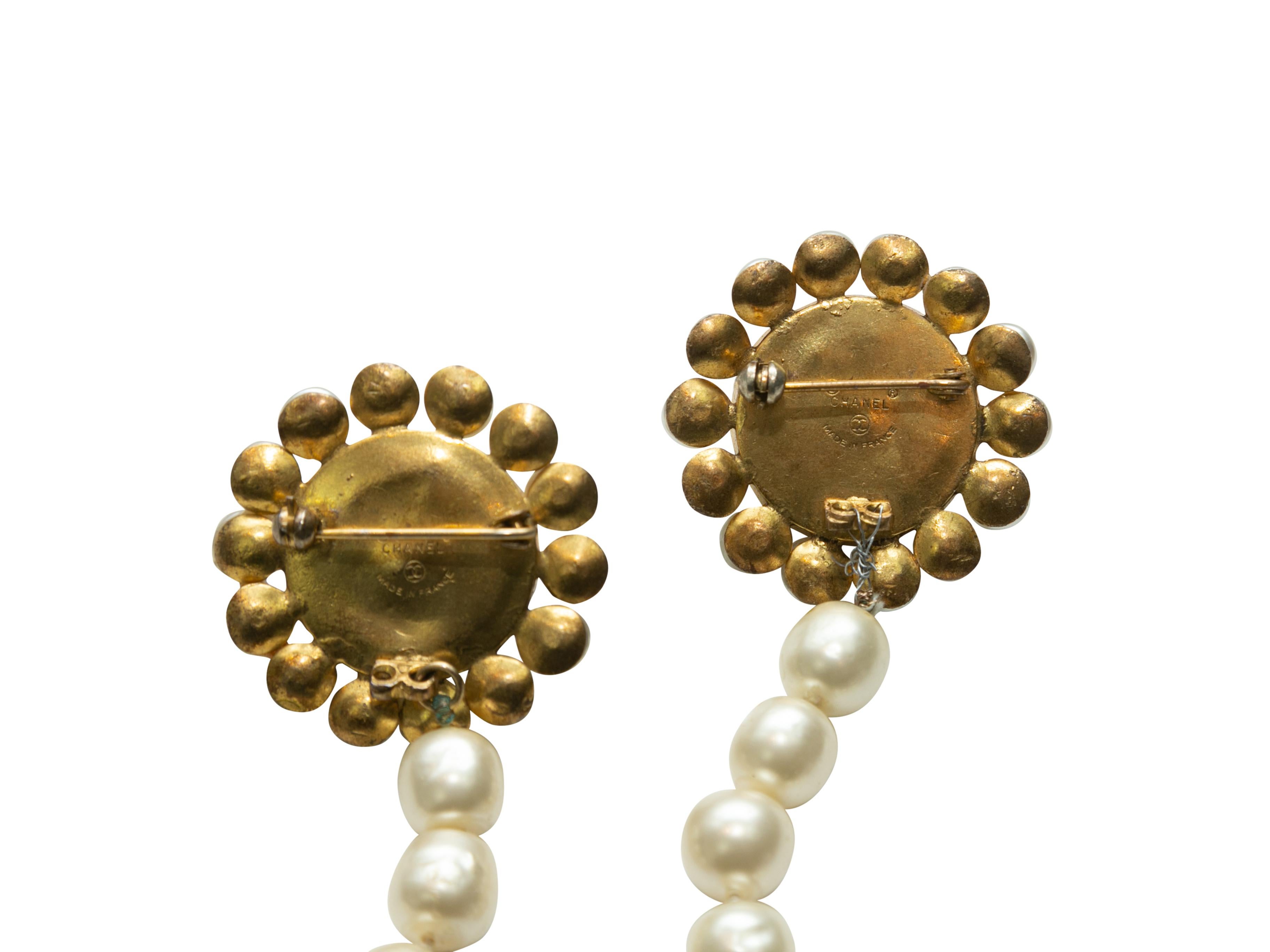 Product details: Vintage gold-tone and faux pearl CC double brooch by Chanel. 1.5