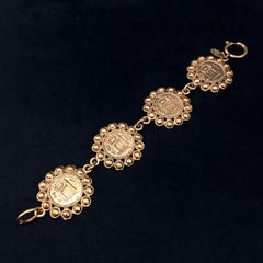 Chanel Gold Tone Gold Plated 31 Rue Cambon Paris Pendants Bracelet, 1994