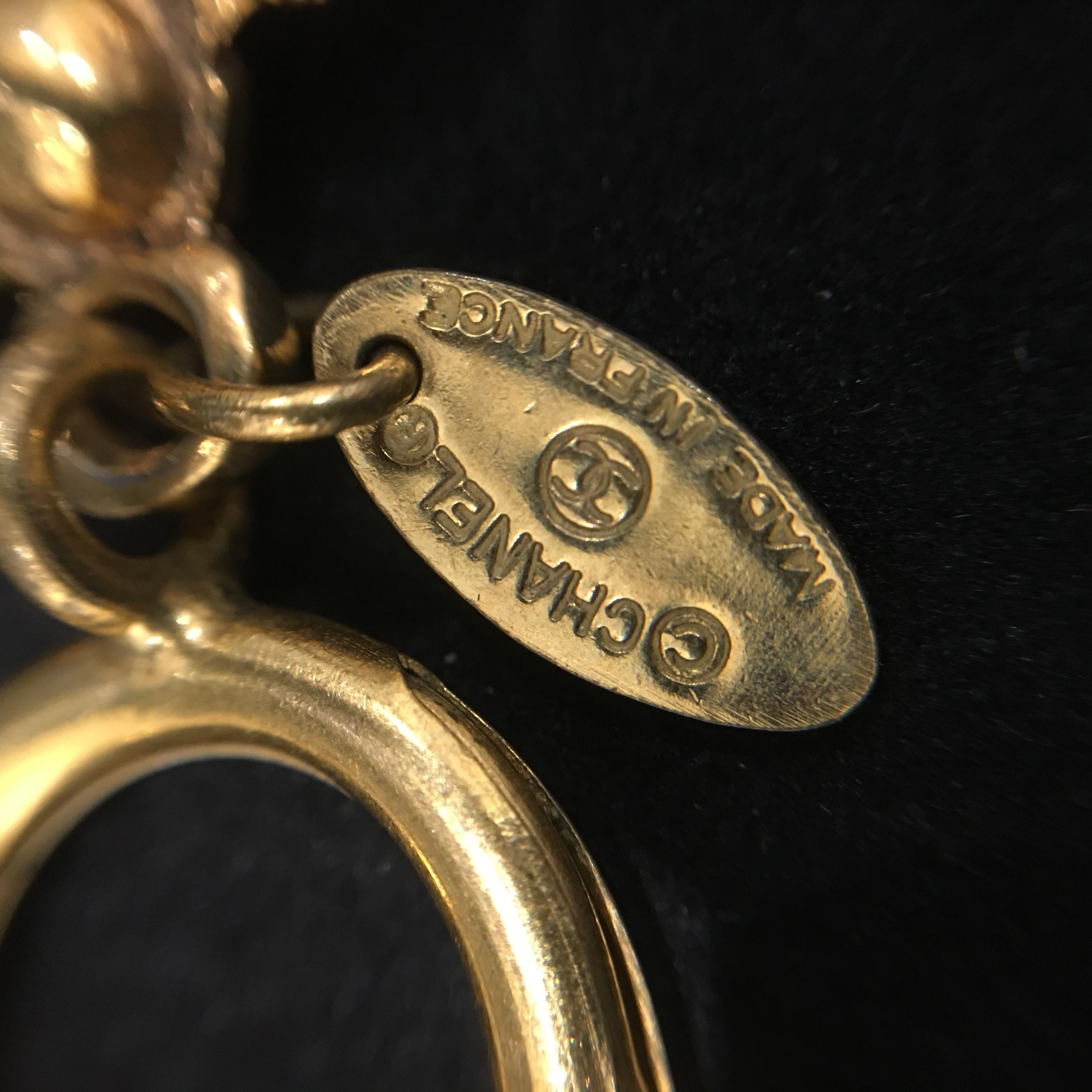 Chanel Gold Tone Gold Plated 31 Rue Cambon Paris Pendants Bracelet, 1994 For Sale 2