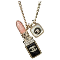 Chanel Gold-Tone Lipstick and Double CC Charm Necklace