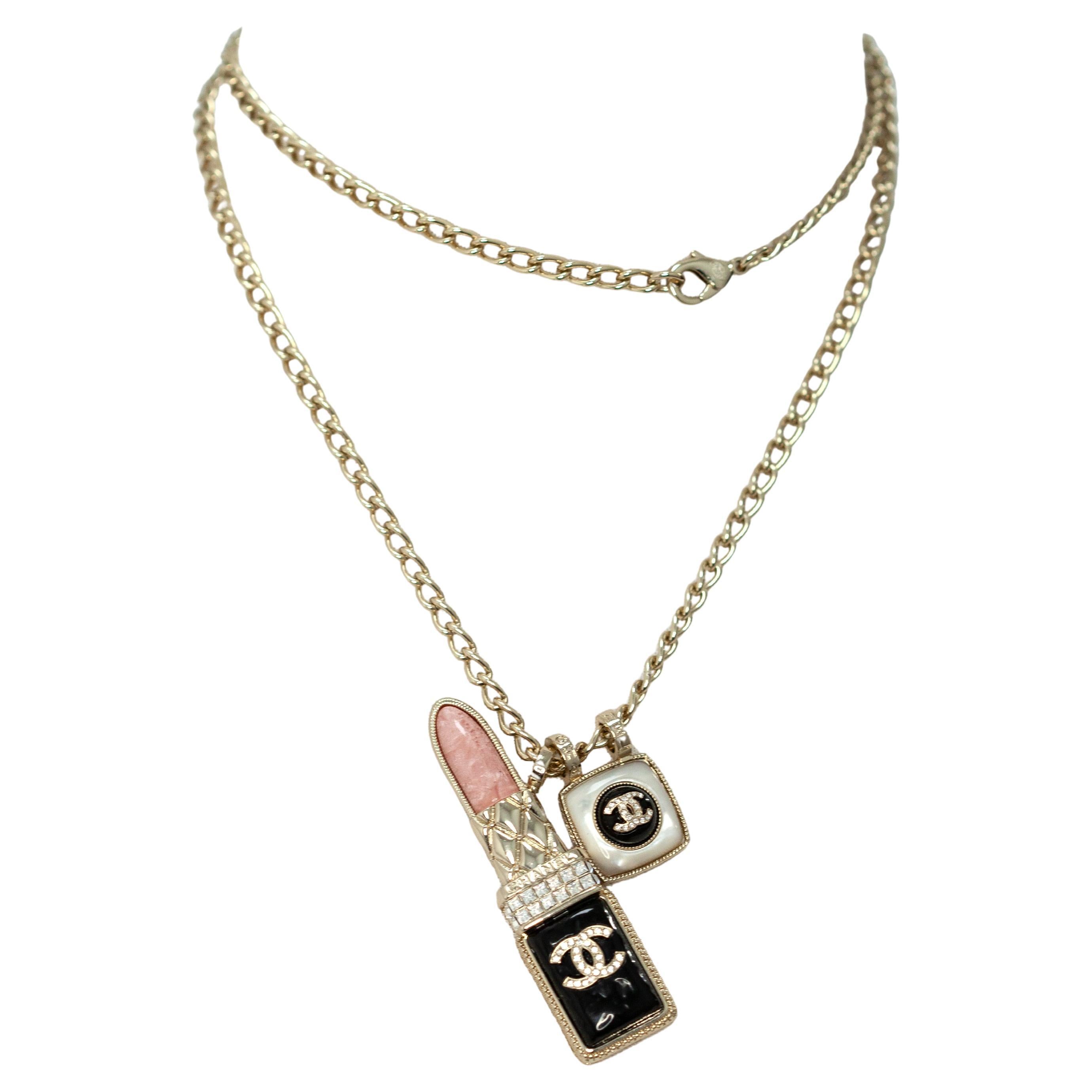 Chanel Gold-Tone Lipstick and Double CC Charm Necklace en venta