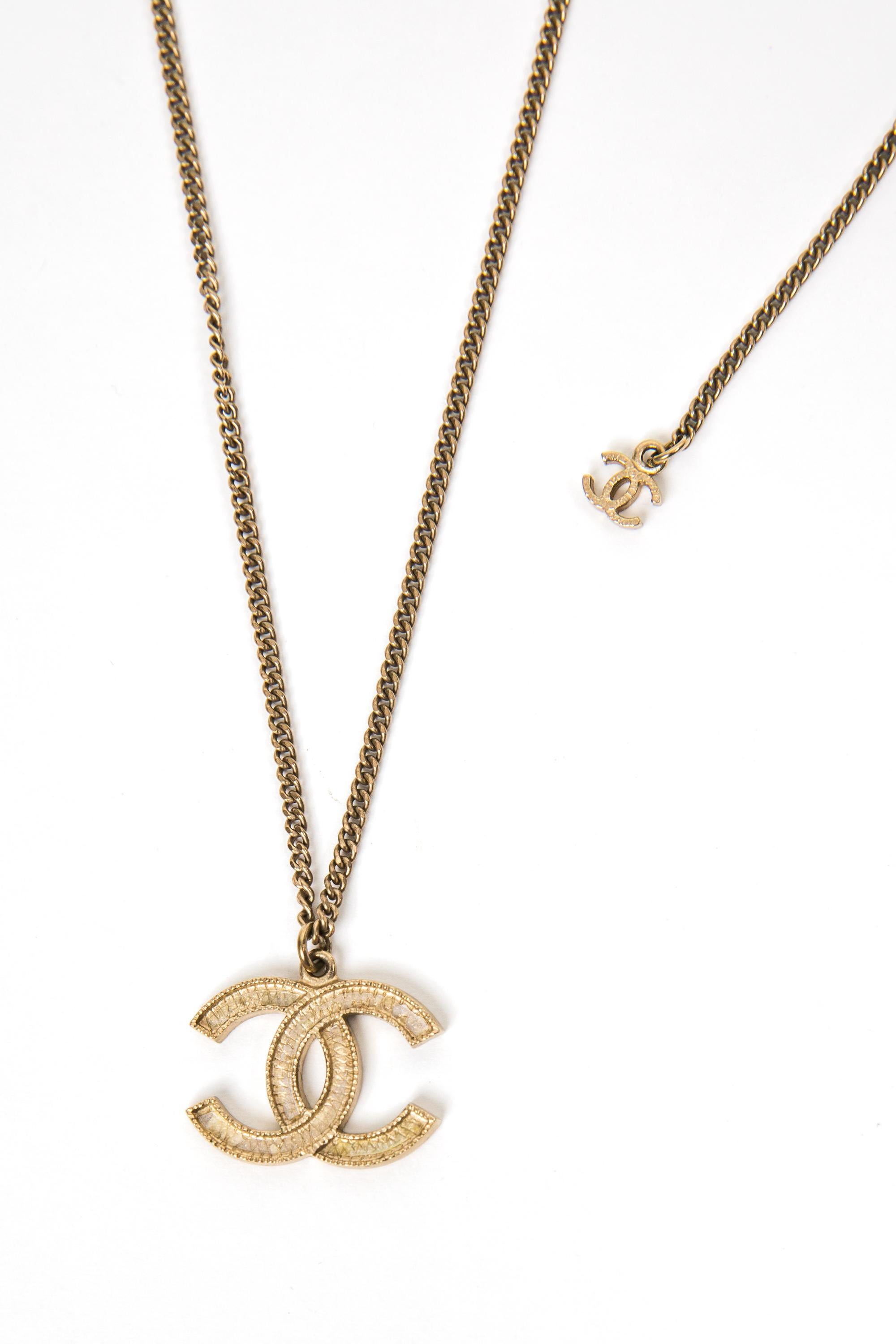 Women's Chanel Gold Tone Logo Pendant Necklace For Sale