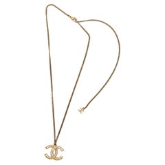 Chanel Gold Tone Logo Pendant Necklace