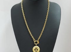 Chanel Gold-tone Metal CC Logo Cutout Sunburst Pendant Necklace
