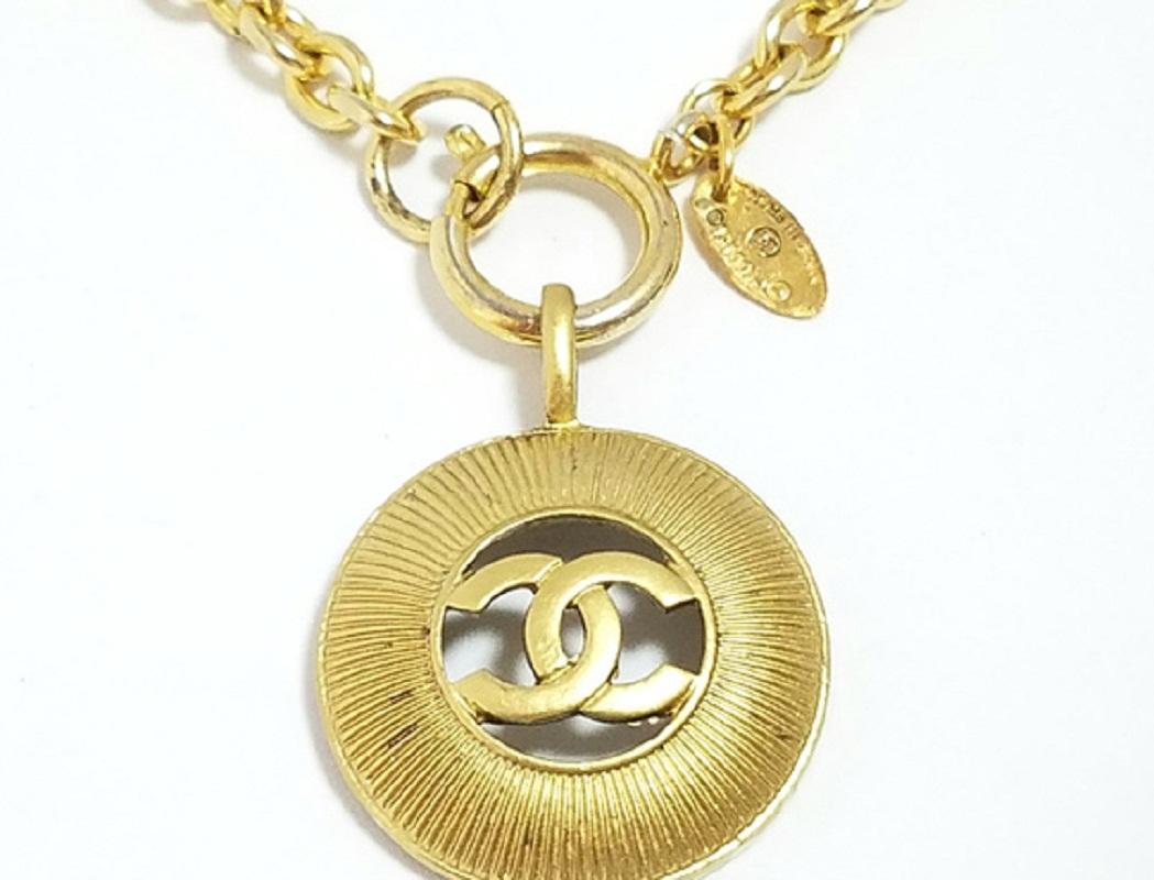 Brown Chanel Gold-tone Metal CC Logo Cutout Sunburst Pendant Necklace