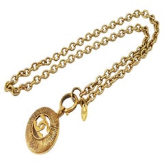 Chanel Gold-tone Metal CC Logo Cutout Sunburst Pendant Necklace