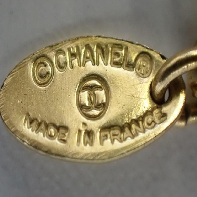 Chanel Gold-Tone Metal CC Logo Sunburst Pendant Necklace 4