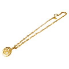 Chanel Gold-tone Metal CC Logo Sunburst Pendant Necklace