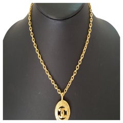 Chanel Gold-Tone Metal CC Logo Sunburst Pendant Necklace