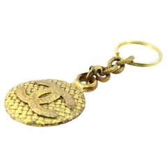 Chanel Gold-tone Metal Round Coco Mark Charm Keyholder