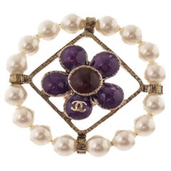 Chanel Gold-Tone Purple Stones and Pearls CC Brooch