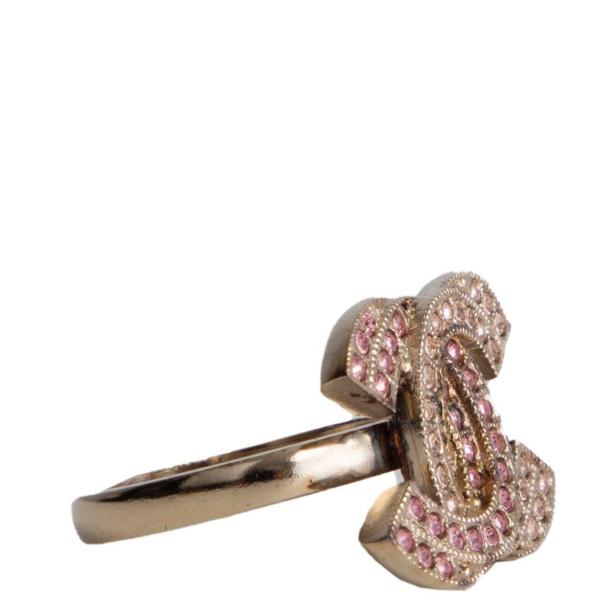 Chanel 'CC' light gold-tone ring with light pink and pink crystal embellished 'CC'. Has been worn and is in excllent condition. Comes with dust bag.

Size 7
Width 2cm (0.8in)
Height 1.5cm (0.6in)
Hardware Light Gold-Tone Plated Silver
