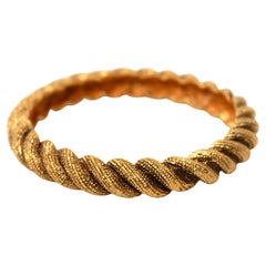 Chanel Gold-Tone Twist Bangle Bracelet circa 1990s