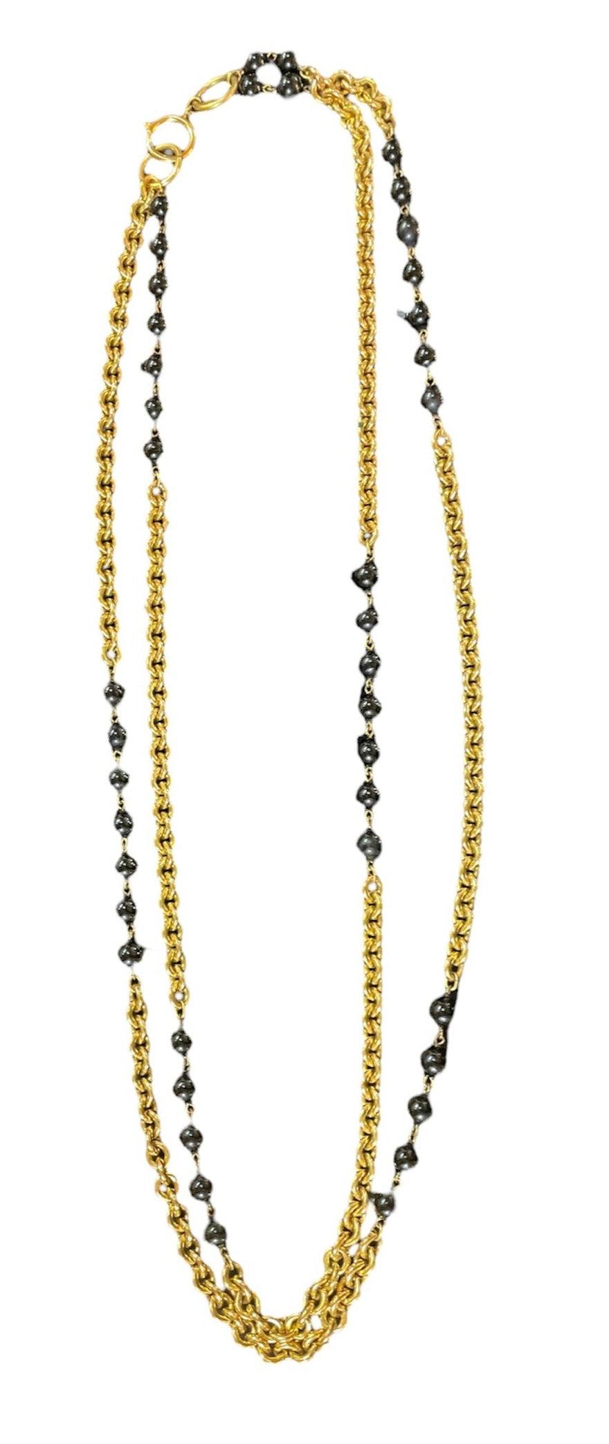 Chanel - Collier à deux rangs de perles noires dorées, 1984 en vente