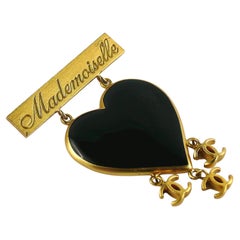 Chanel Gold Toned Black Enamel Heart Mademoiselle CC Charms Brooch, Spring 2002