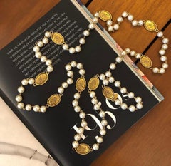 Vintage CHANEL Gold Toned Medallion Faux Pearl Long Chain Necklace