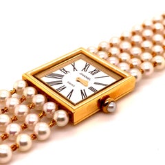 Chanel Gold Watch with Pearl Bracelet