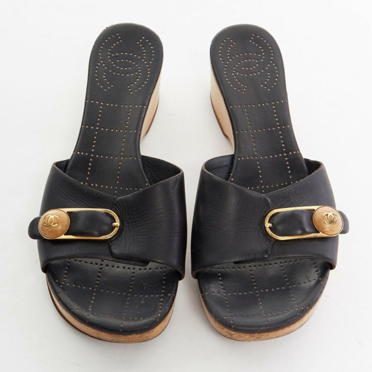 CHANEL gold wooden CC buckle black leather wooden platform clog sandals ...