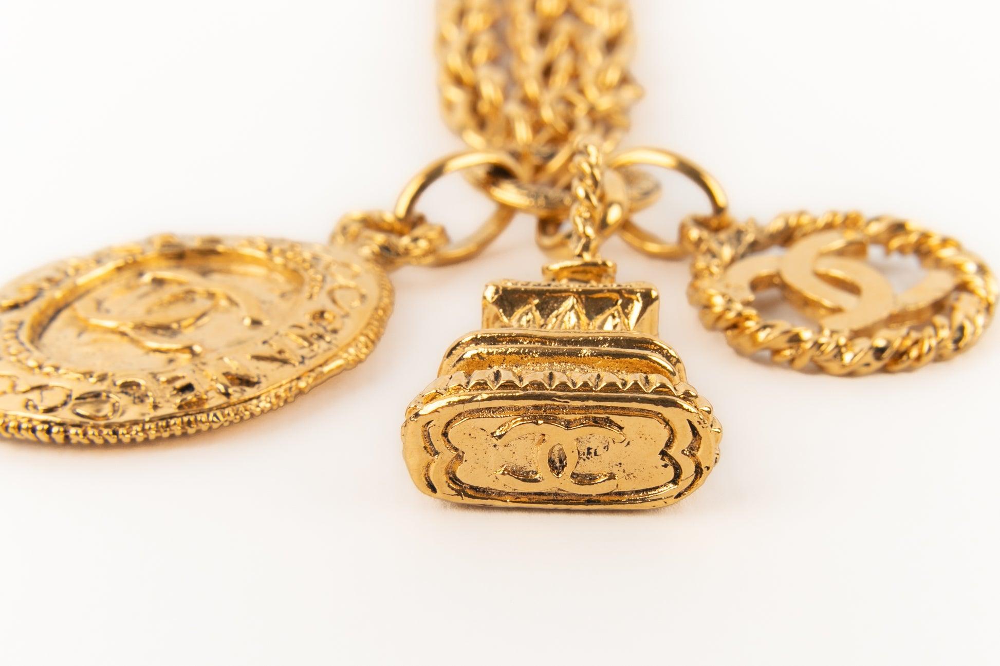 Women's Chanel Golden Metal Bracelet with Charms, 1980s For Sale