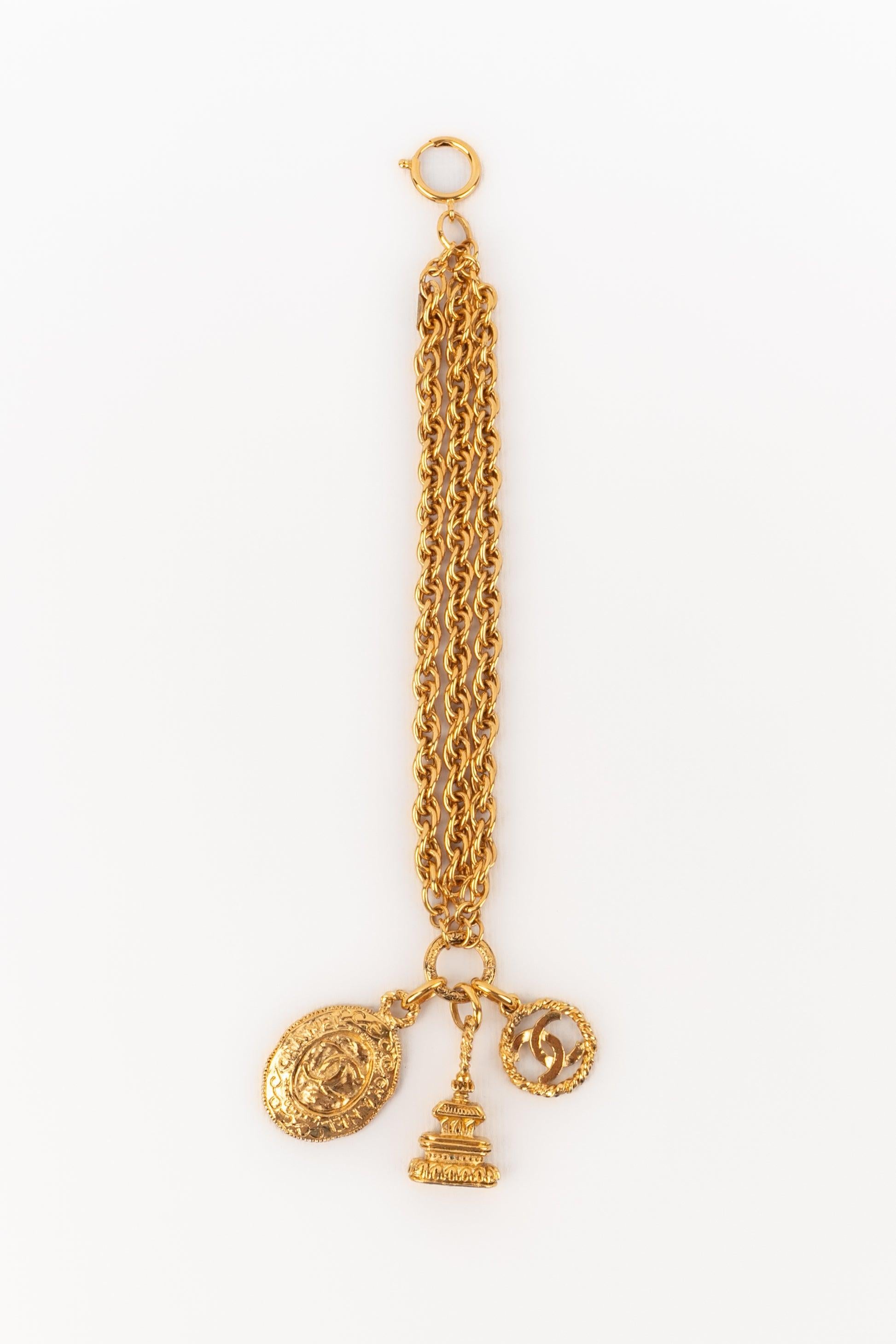 Chanel Golden Metal Bracelet with Charms, 1980s For Sale 1