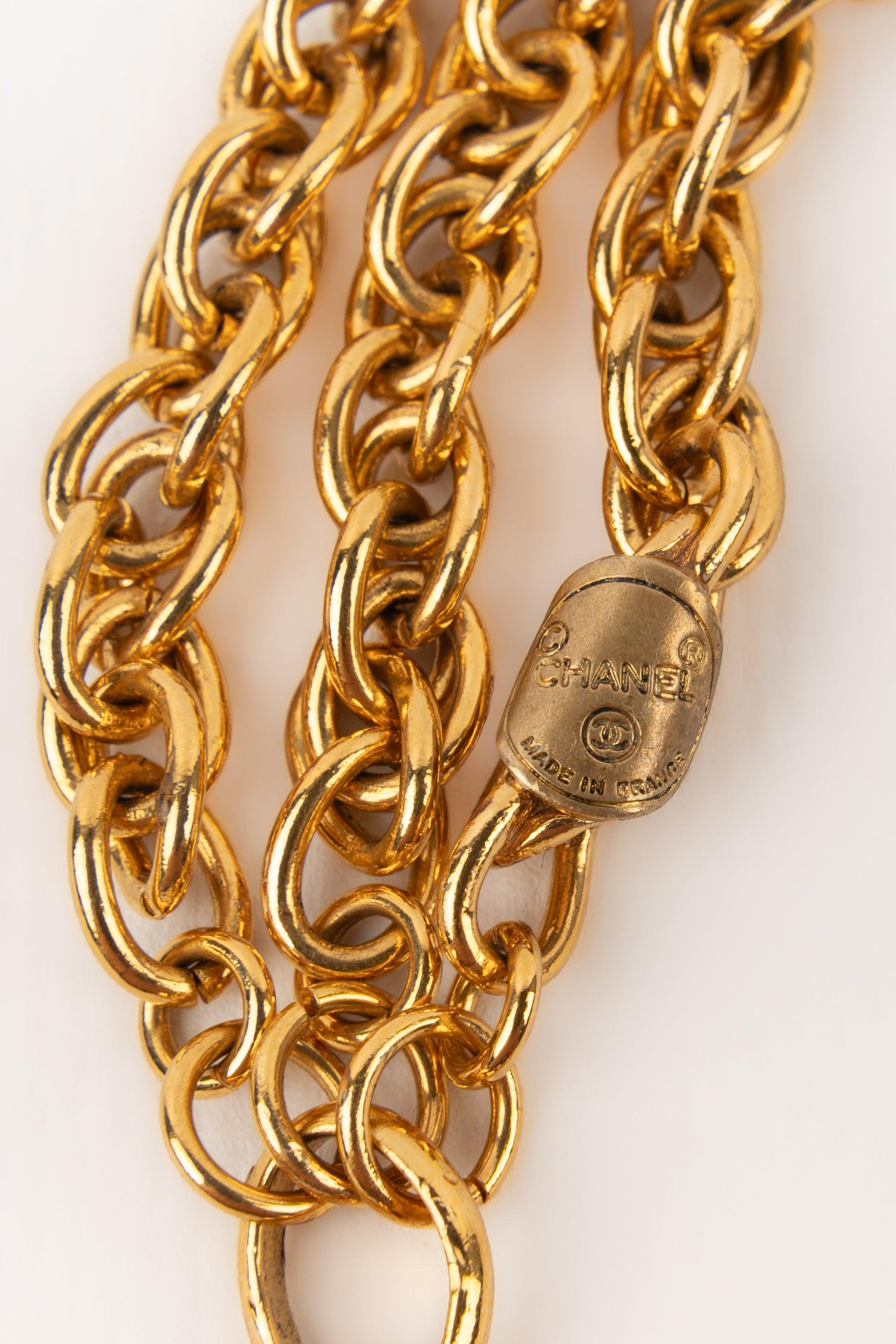 Chanel Golden Metal Bracelet with Charms, 1980s For Sale 2