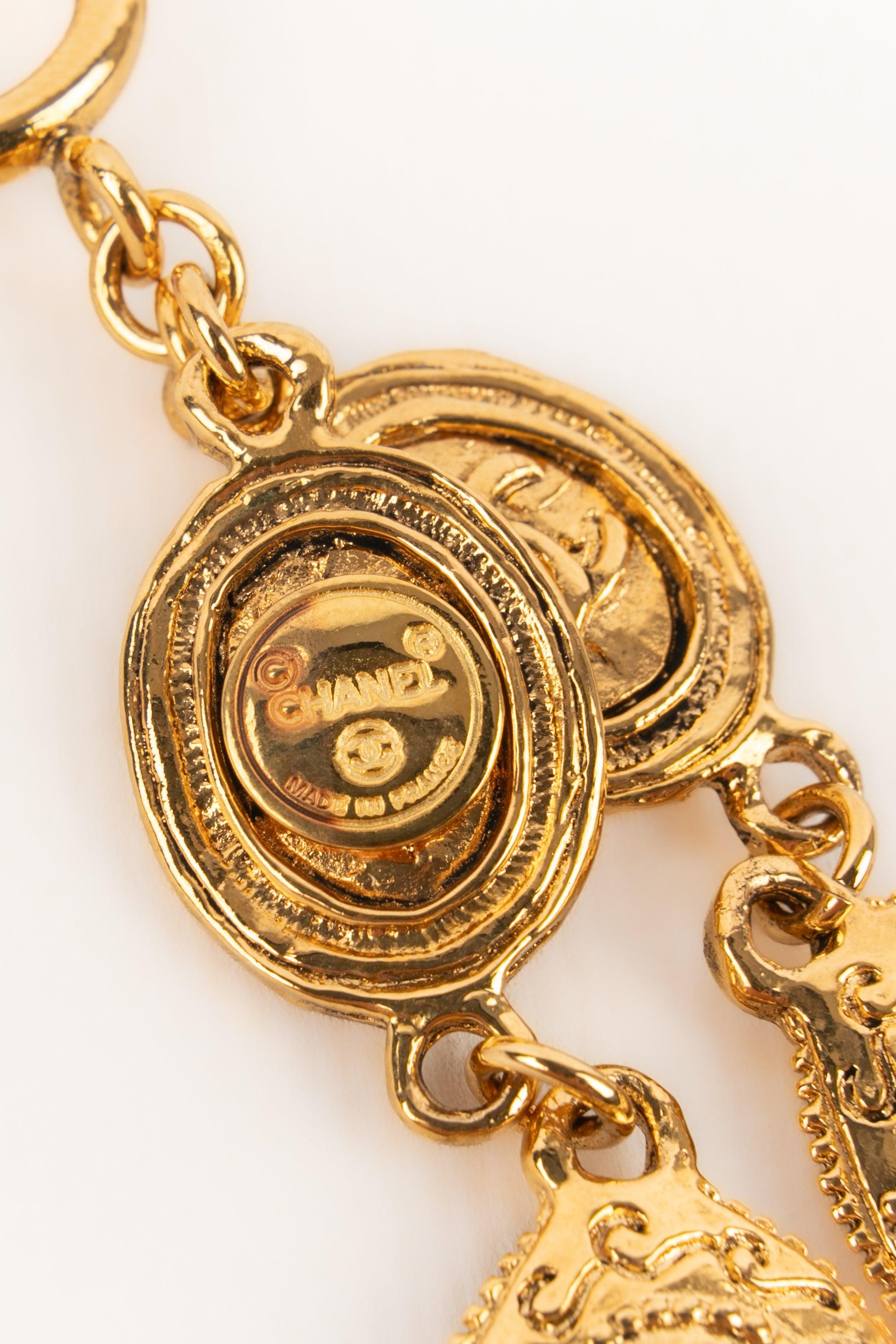 Women's Chanel Golden Metal Charm Bracelet, 1980s For Sale
