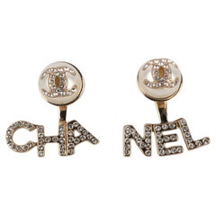 Chanel Golden Metal Earrings with Rhinestones, 2023