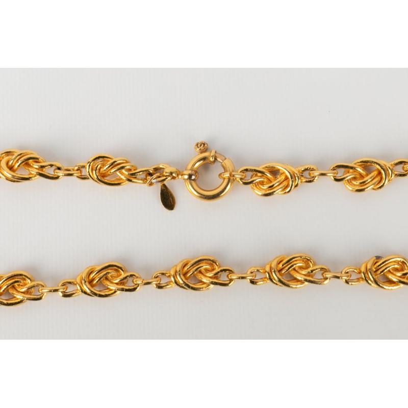 Chanel Sautoir en métal doré avec nœuds en vente 4