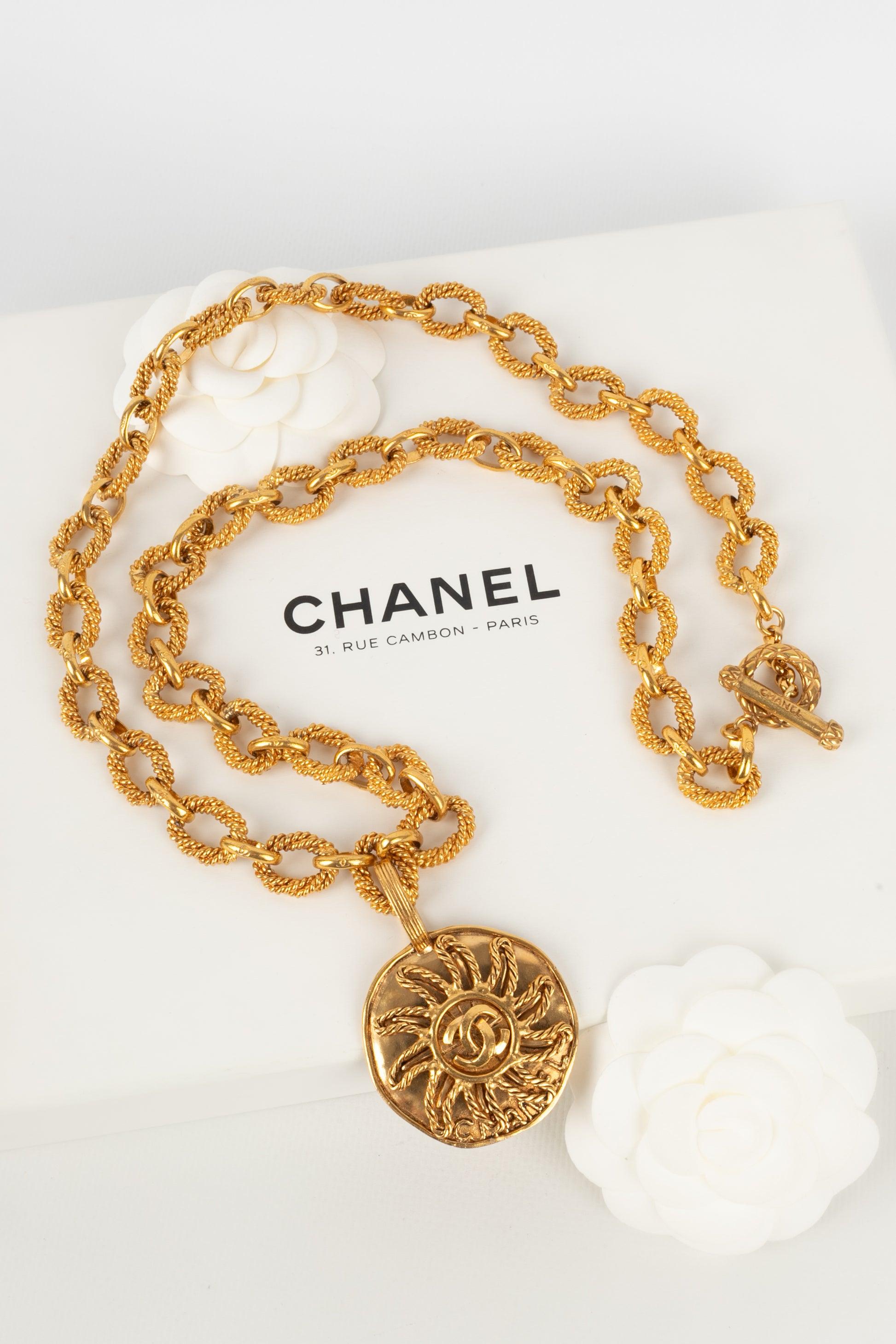 Chanel Golden Metal Necklace with a Sun Pendant, 1993 For Sale 6