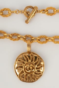 Chanel Golden Metal Necklace with a Sun Pendant, 1993
