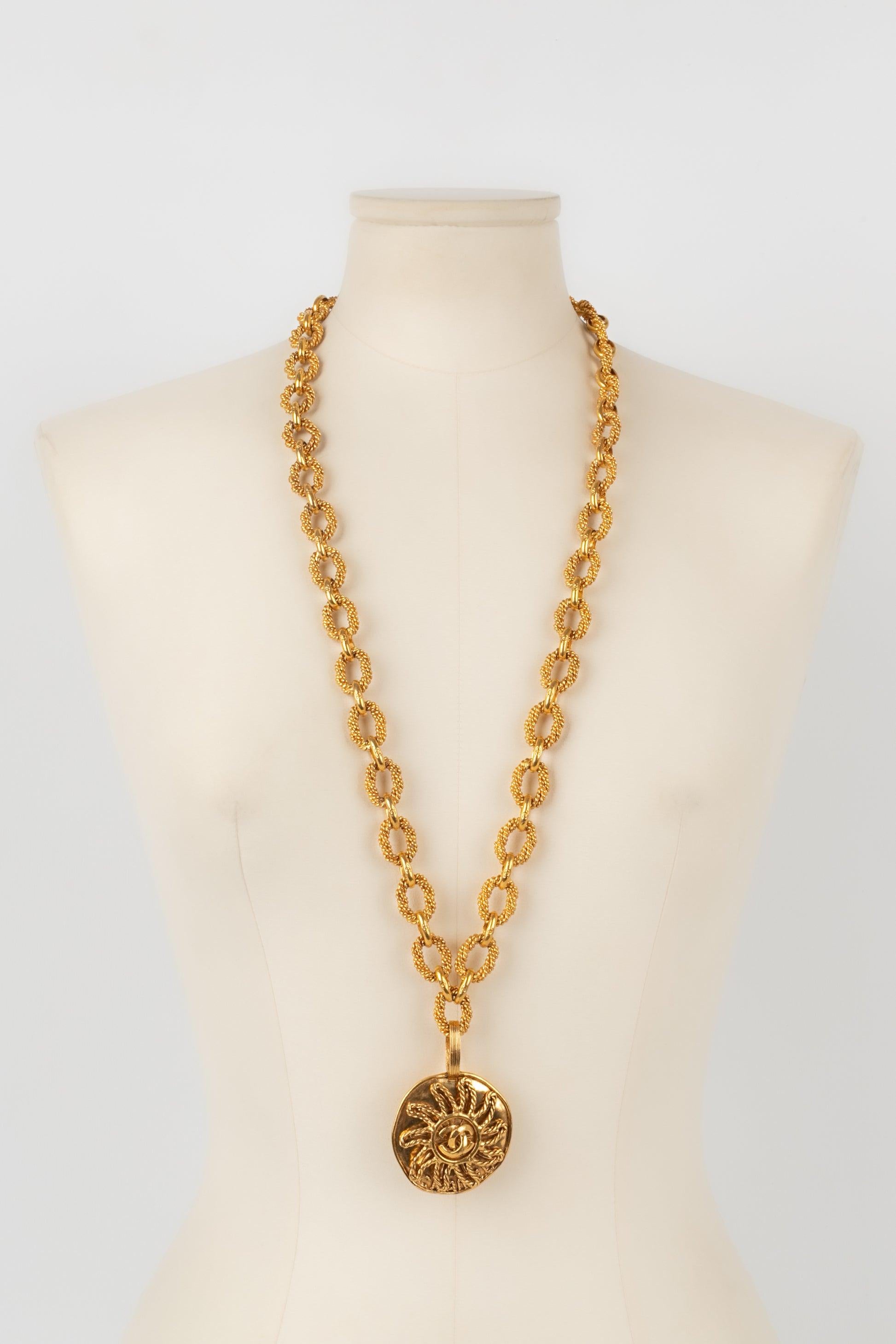 Chanel Golden Metal Necklace with a Sun Pendant, 1993 For Sale 4