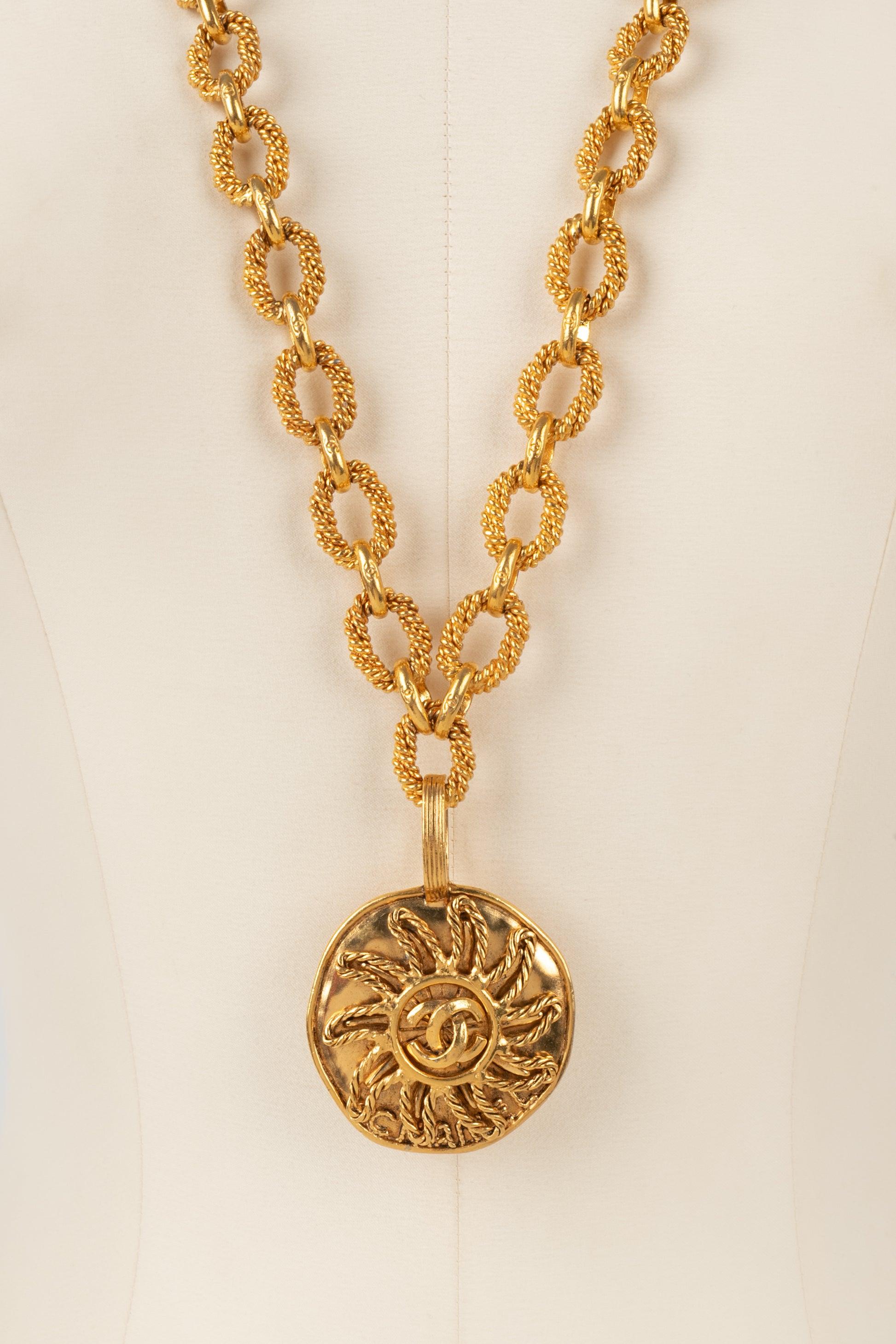 Chanel Golden Metal Necklace with a Sun Pendant, 1993 For Sale 5