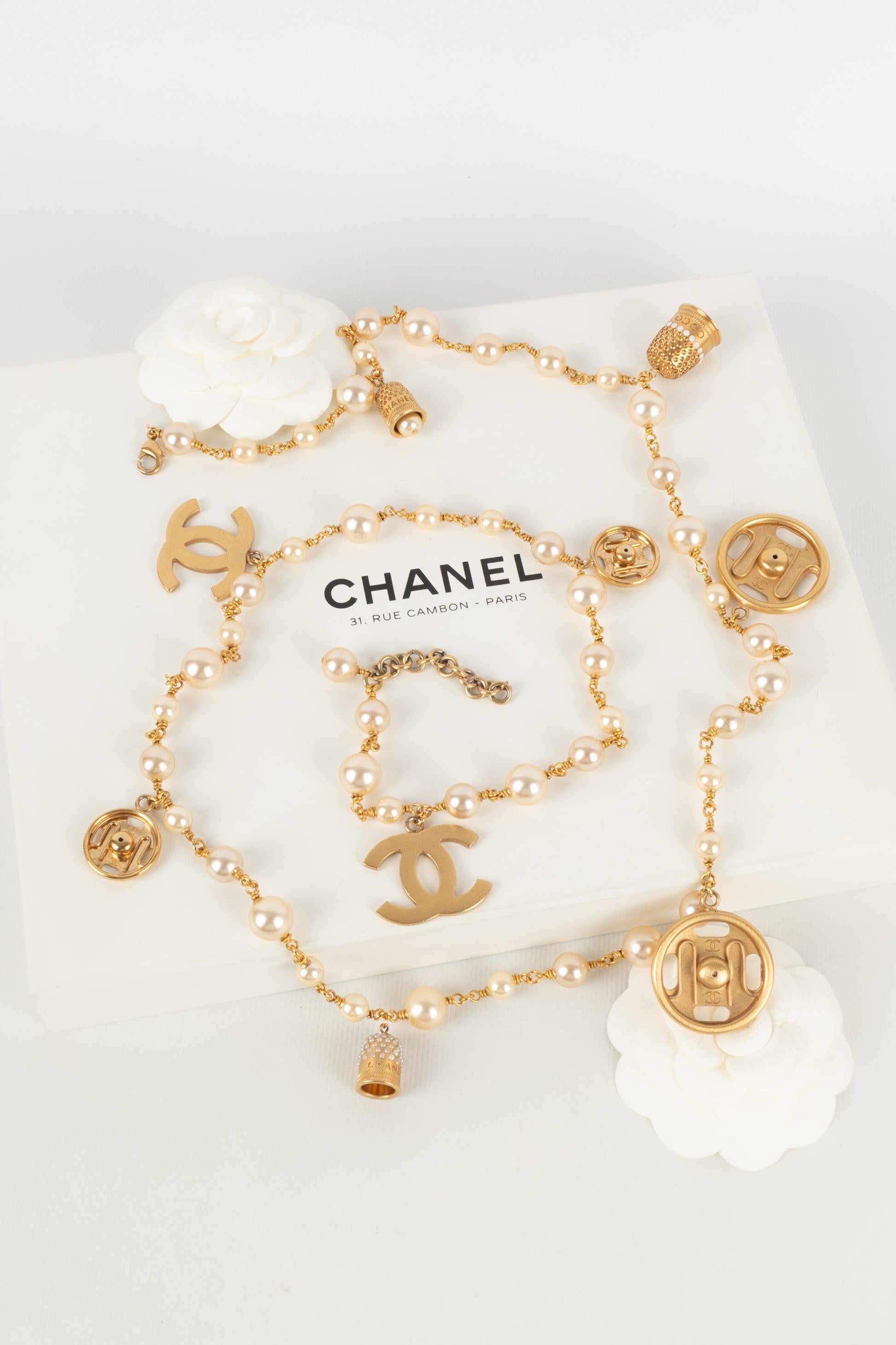 Chanel Golden Metal Necklace with Costume Pearls and Charms Fall, 2003 5